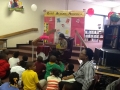 A'Keti reading to students